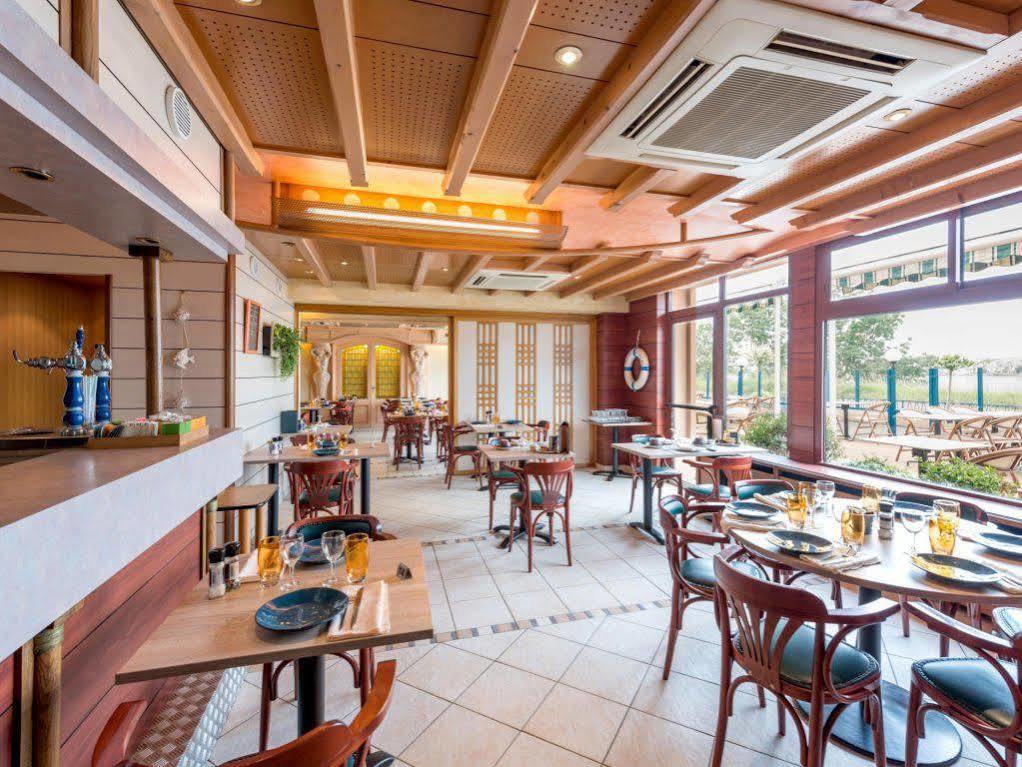Logis Hotels - Au Poisson D'Argent - Hotel 3 Etoiles Et Restaurant Le Mesnil-en-Vallée Esterno foto